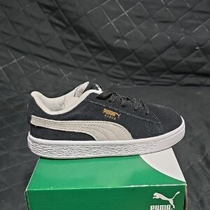 Puma Suede Black and White Sneakers
